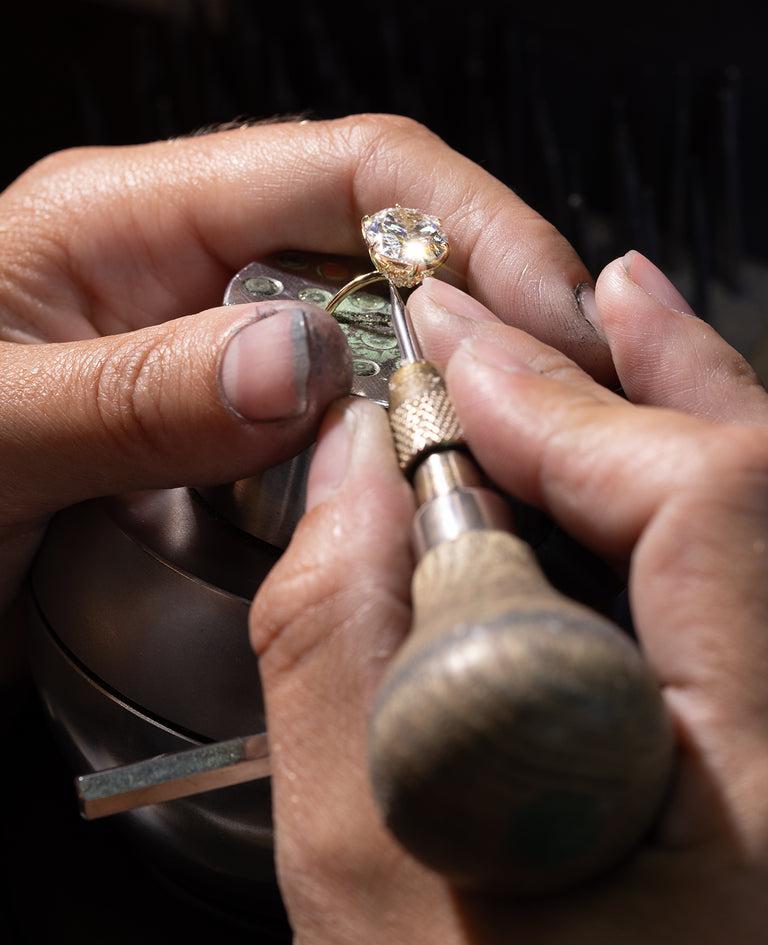 Jeweler creating custom rings in Central Valley with a gemstone setting and detailed craftsmanship.