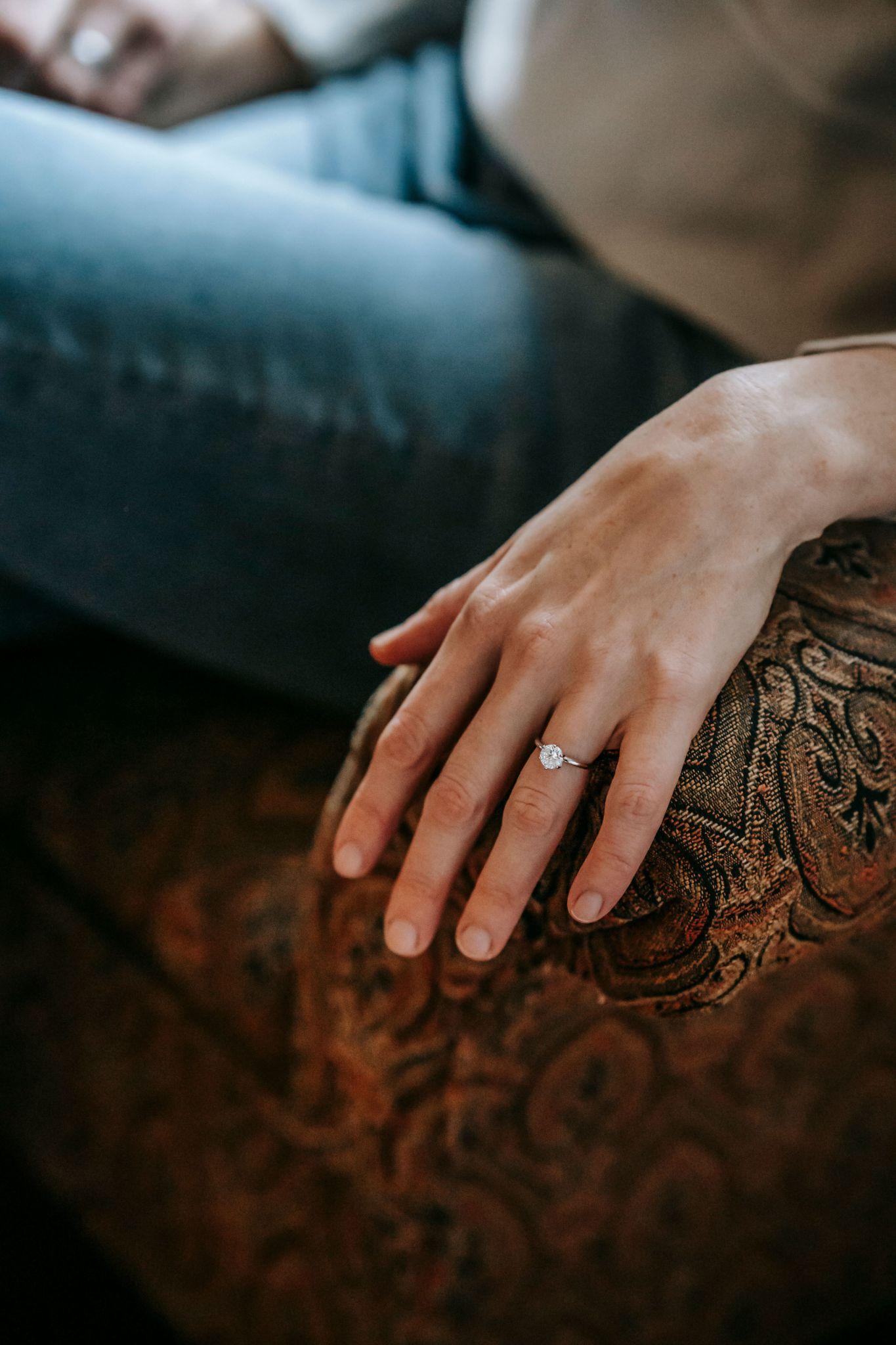 Diamond engagement ring with a detailed band